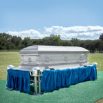 A Frigid Imperial Plain Package lowering device Sitting on a Frigid Telescoping Stand with Blue Drape and Graveside Grass Set